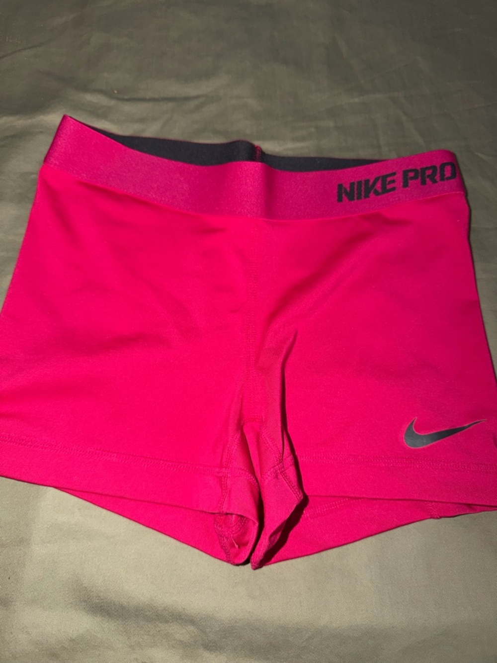 Bright pink Nike Pro shorts. Size small